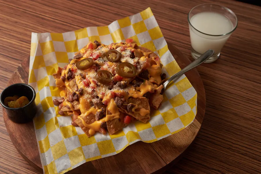 Loaded nachos with cheese and salsa