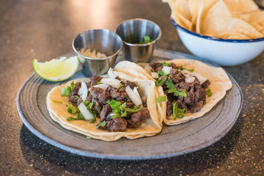 Street tacos with lime and salsa